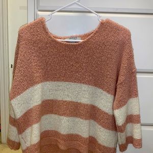 knitted pink and white sweater